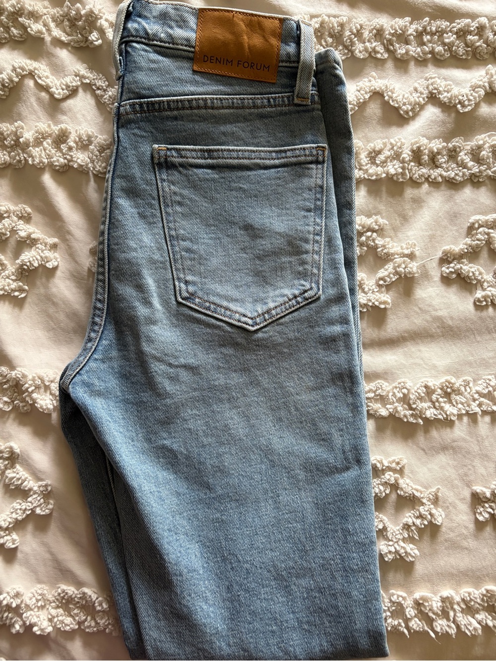Denim Forum High-Rise Light Blue Jeans with Leather Patch